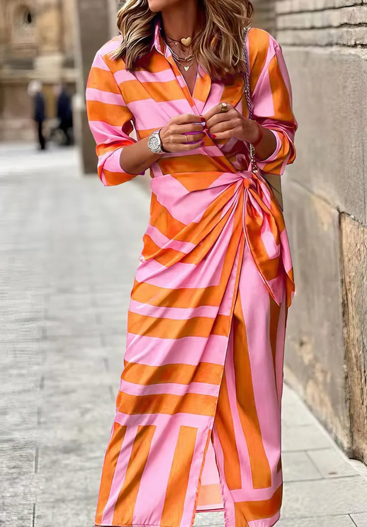 Vibrant printed midi wrap dress for women, ideal for chic summer outings and casual elegance.