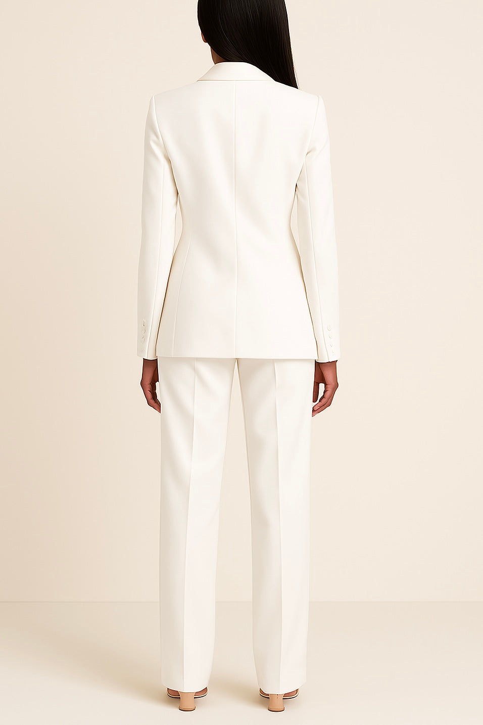 Modern women's tailored suit set with a sleek black blazer and trousers, suitable for businesswomen
