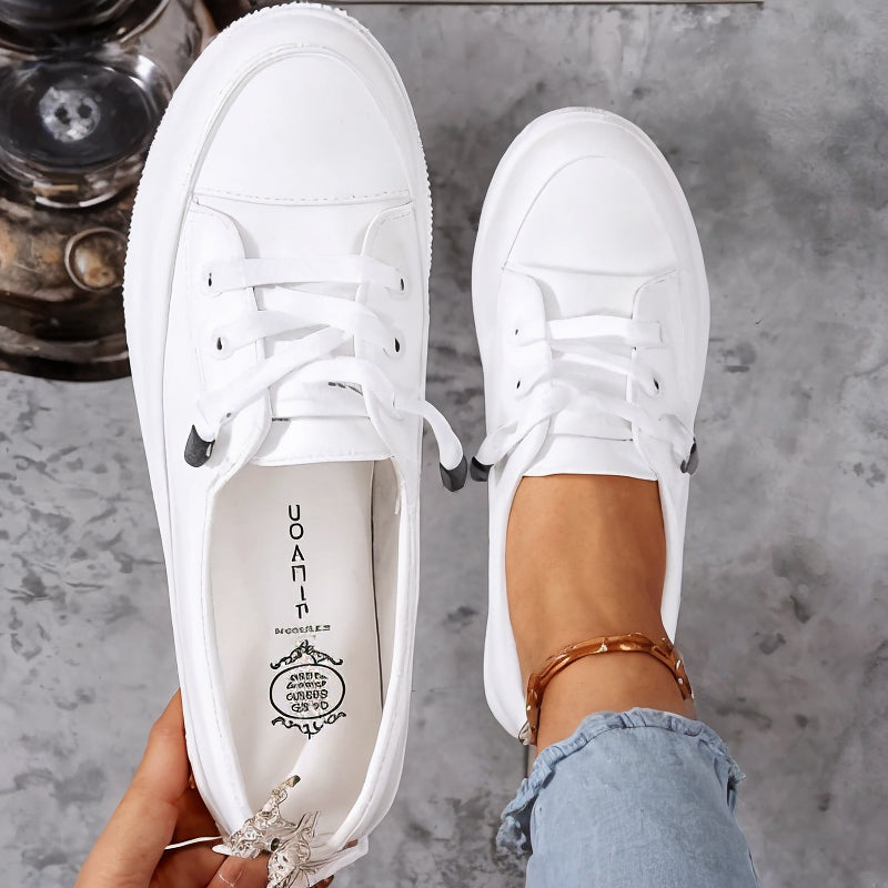Versatile women's casual flatform court shoes with a classic lace-up design, ideal for everyday style.
