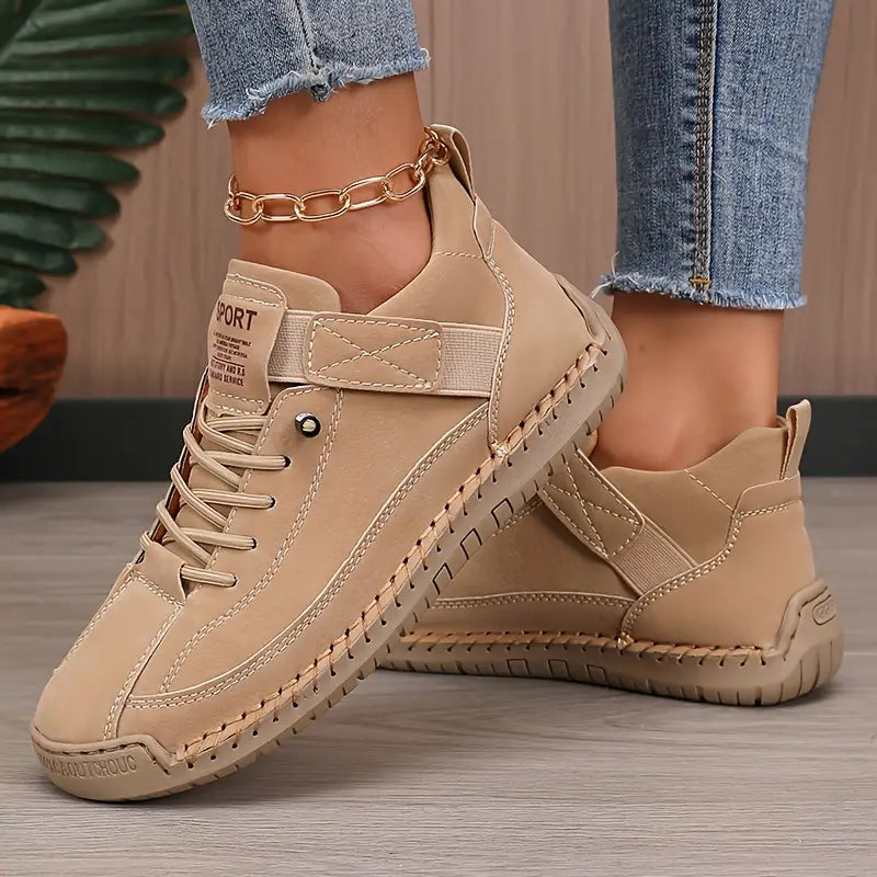 Cushioned women's orthopedic walking sneakers, ideal for comfort and arch support.