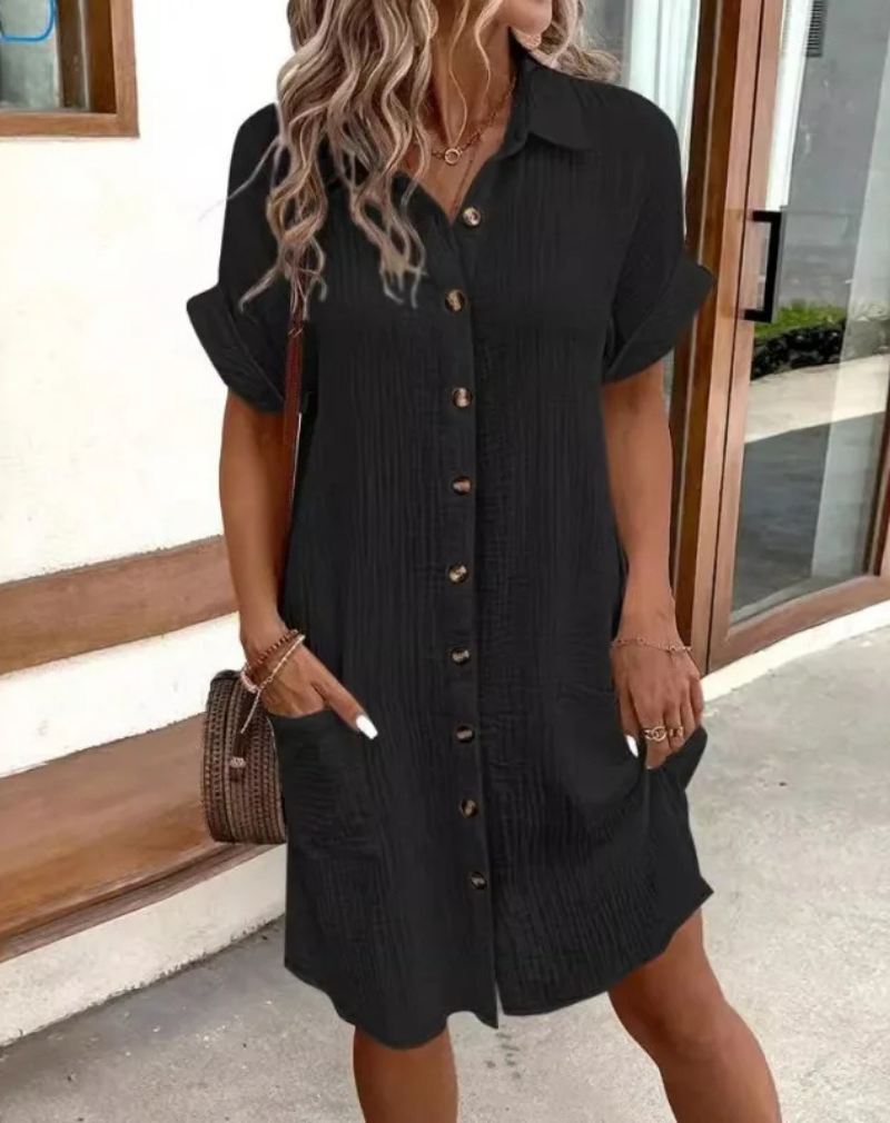 Stylish women's mini shirt dress with collar & full button-down front. Ideal short sleeve casual summer dress.