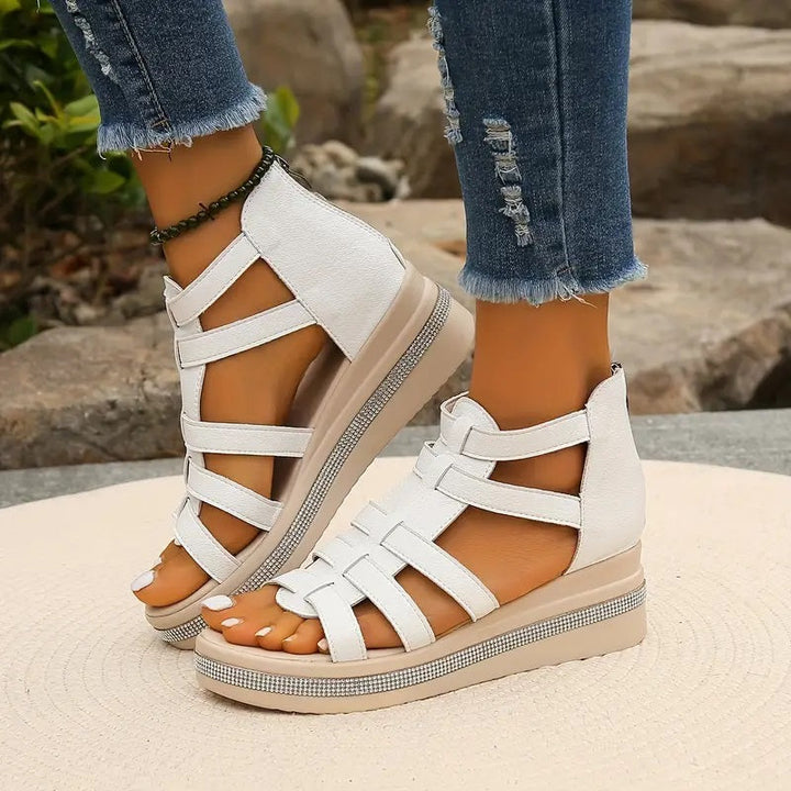 Rhinestone detailed women's comfort sandals, offering stylish design and all-day support.