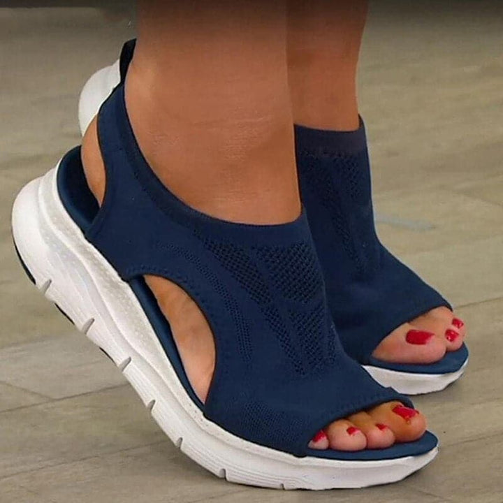 Women's comfortable beige open-toe sandals, ideal for spring and summer casual wear.