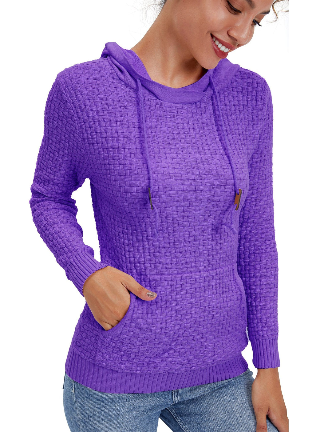 Detail of the ribbed cuffs and hem on a women's breathable pullover hoodie.
