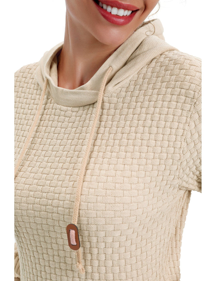 Women's hoodie in a light studio setting, highlighting the material's breathability and softness.