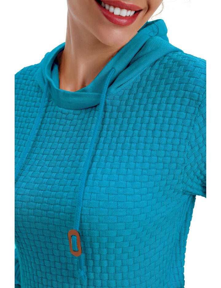 Folded women's cotton blend hoodie, showing its compact nature for easy storage.