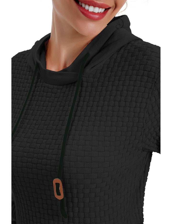 Close-up on the pocket area of a women's comfortable pullover hoodie, practical design.