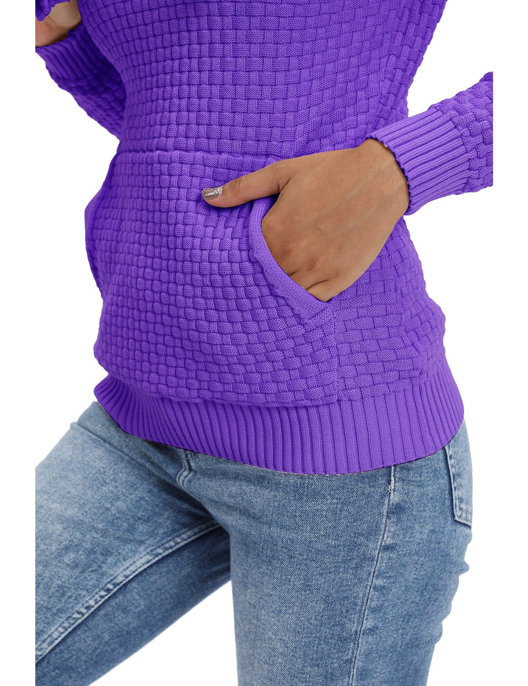 Model casually leaning while wearing a women's comfortable grey hoodie, relaxed posture.