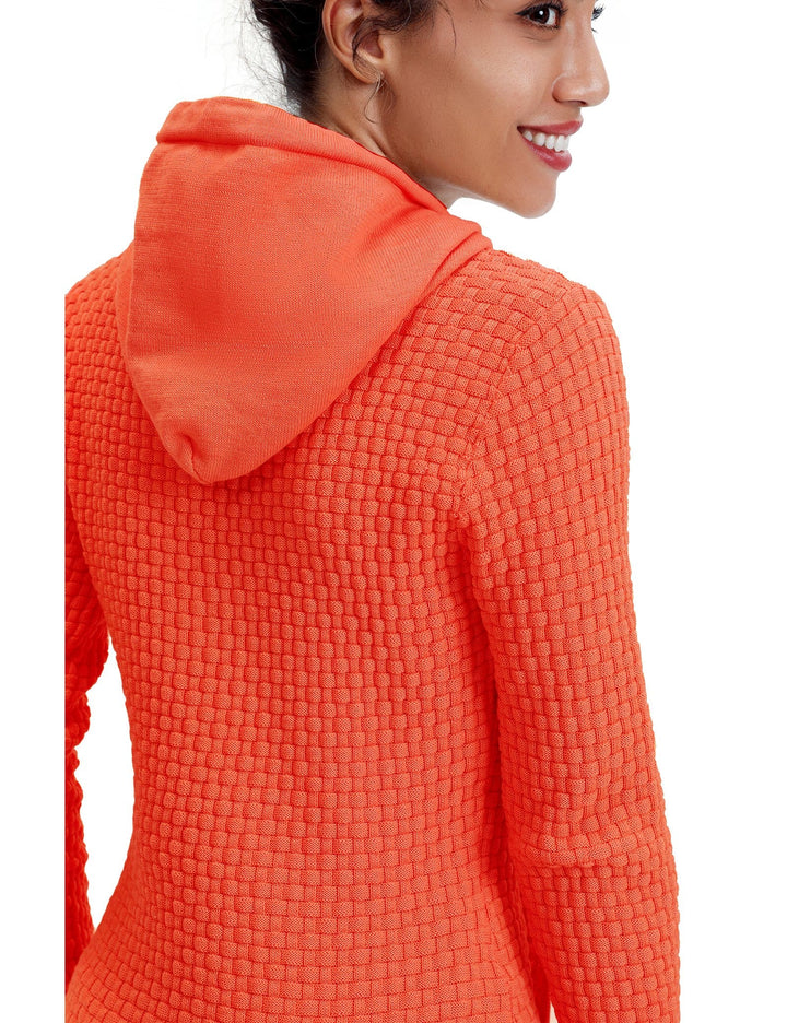 Model in an outdoor setting wearing a casual breathable hoodie, showcasing versatility.