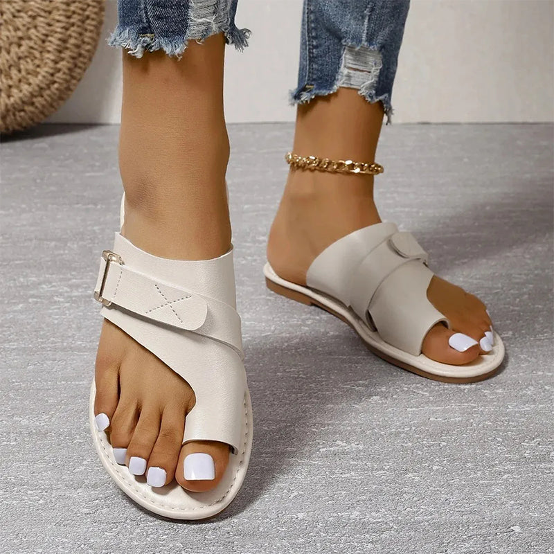 Everyday women's buckle sandals, offering comfort and style for versatile warm weather looks.