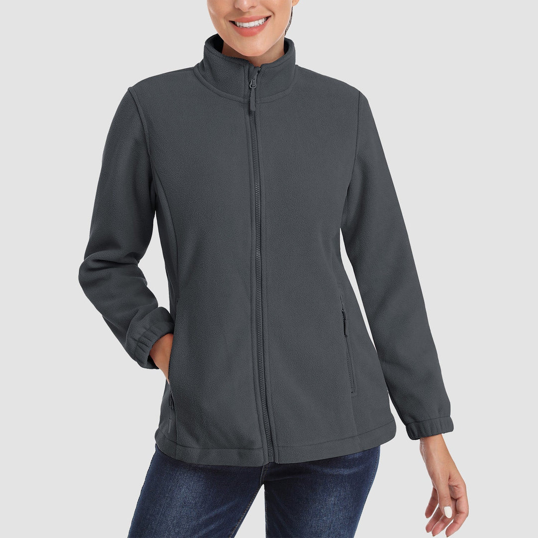 Detail of the full-zip closure on a women's comfortable fleece jacket, an essential casual jacket