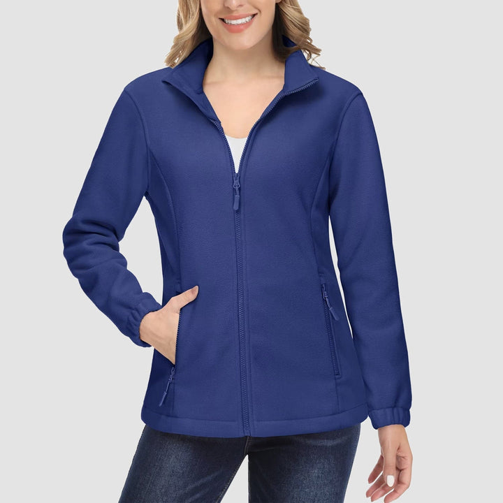 Collection of women's full-zip fleece jackets in various colors, showcasing options for winter wear