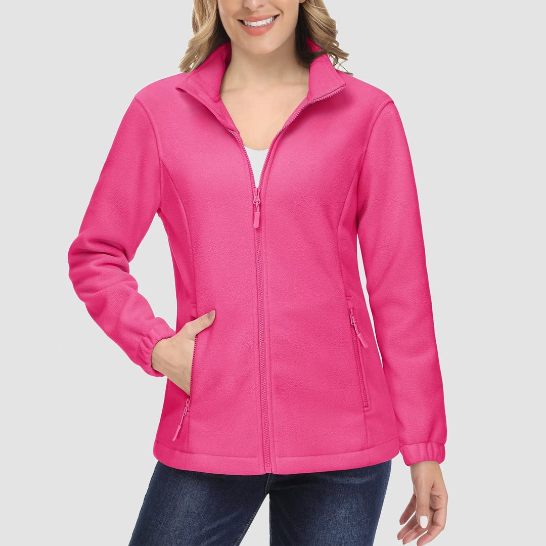Display of women's full-zip fleece jackets on hangers, ready for everyday and cold weather wear