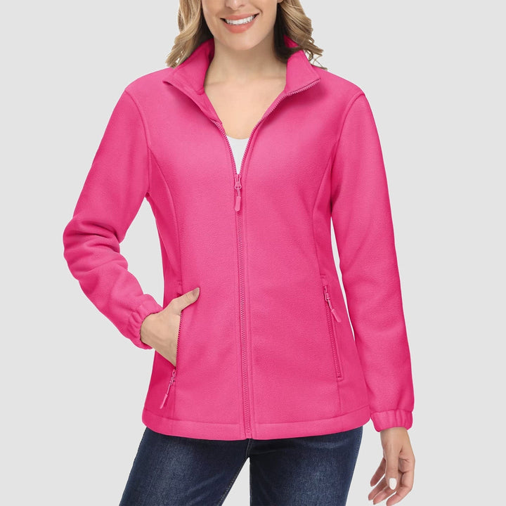 Display of women's full-zip fleece jackets on hangers, ready for everyday and cold weather wear