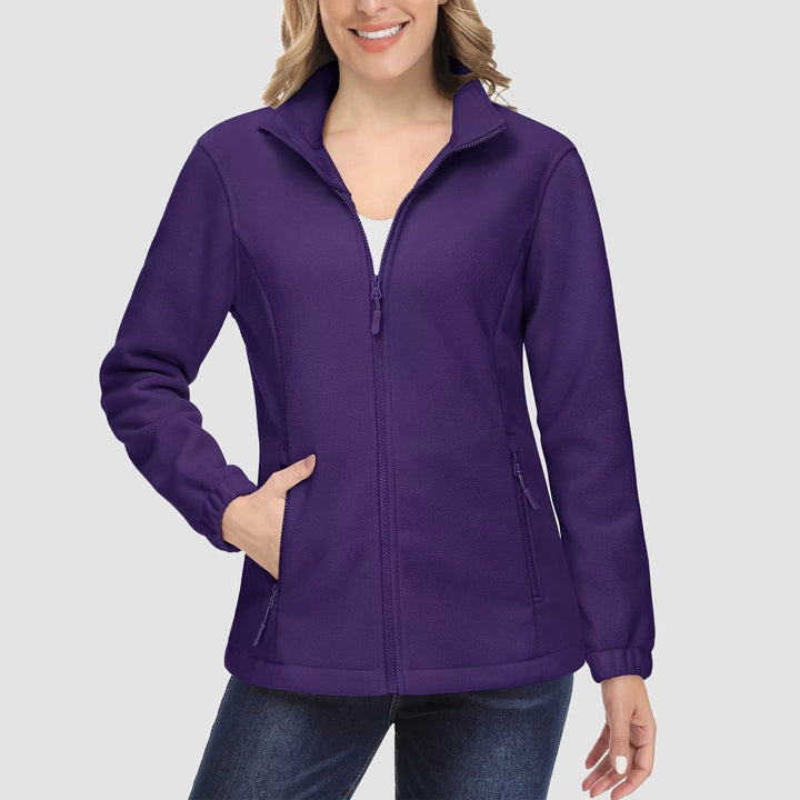 Close-up of a women's full-zip fleece jacket pocket, a practical feature for everyday use