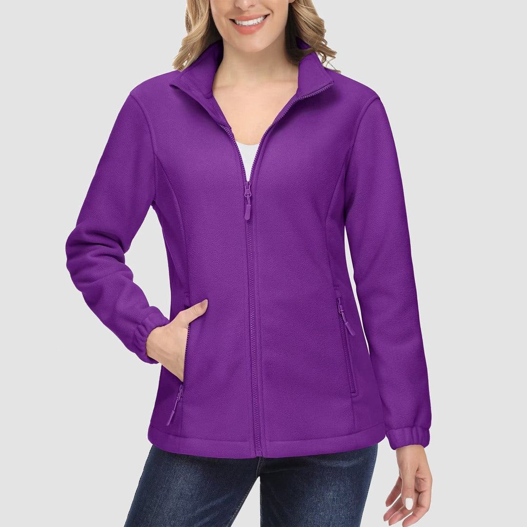 Flat lay of a women's full-zip fleece jacket in a beautiful coral, an eye-catching fall fashion piece