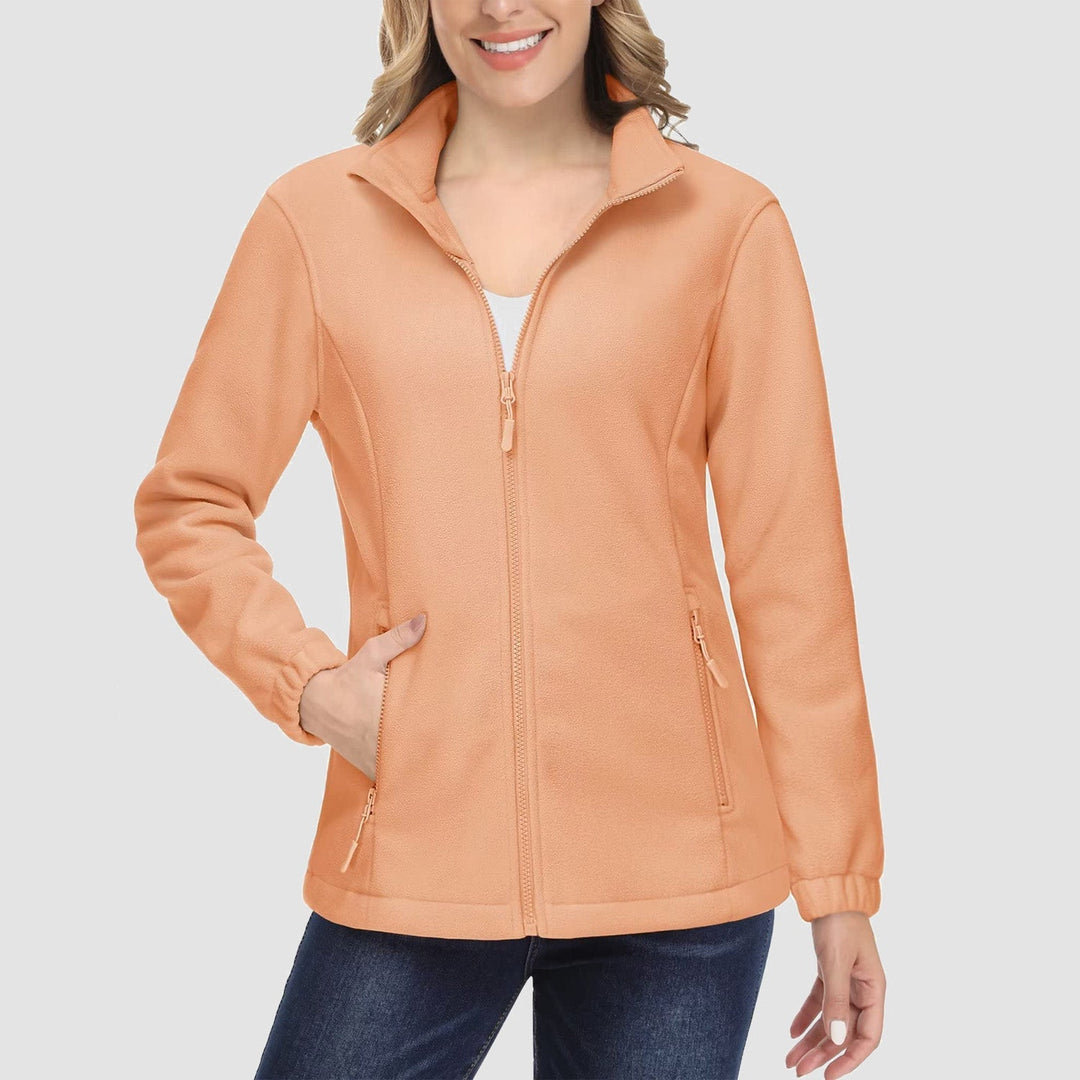 Women's full-zip fleece jacket modeled with athleisure wear, showcasing its athletic and casual appeal