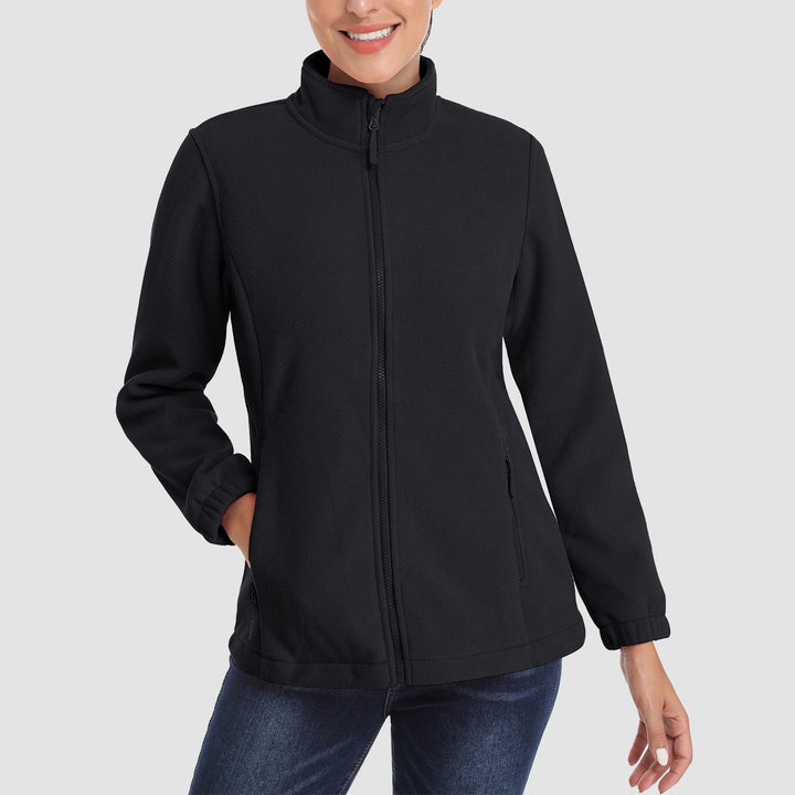 Close-up of a women's full-zip fleece jacket texture, highlighting its comfortable material