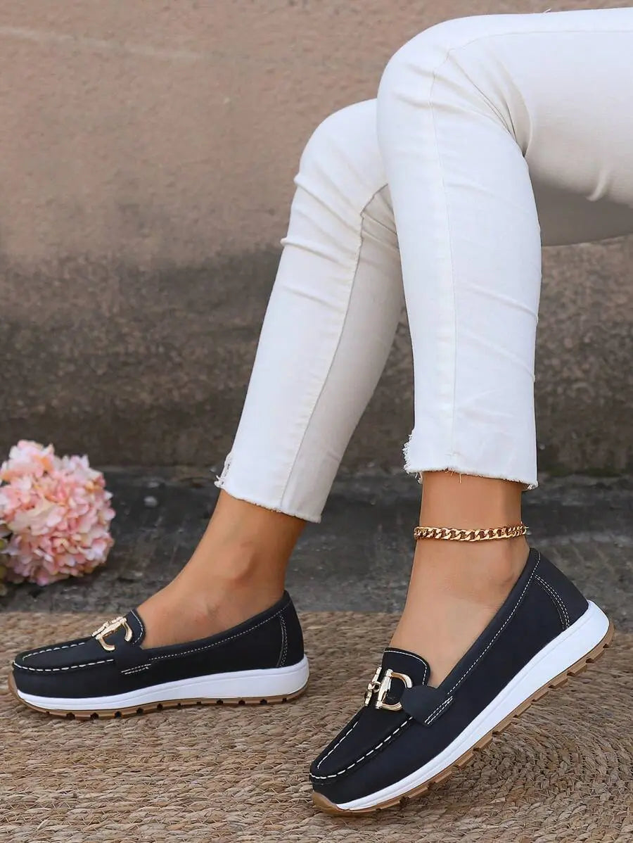 Comfortable women's orthopedic shoes, designed as slip-on loafers with arch support.