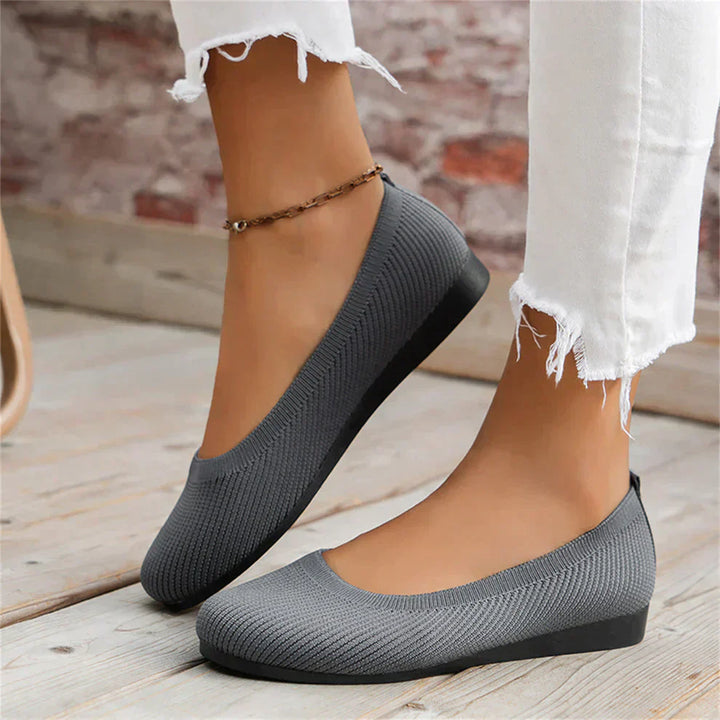Close-up of a comfortable women's ballet flat in a neutral beige for spring
