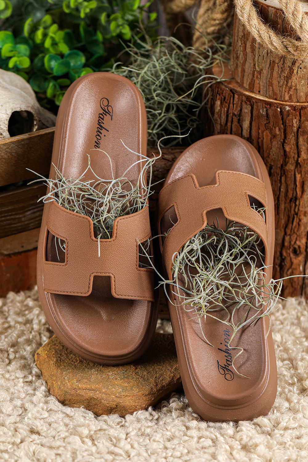Durable women's strappy sandals, comfortable for summer strolls and activities.