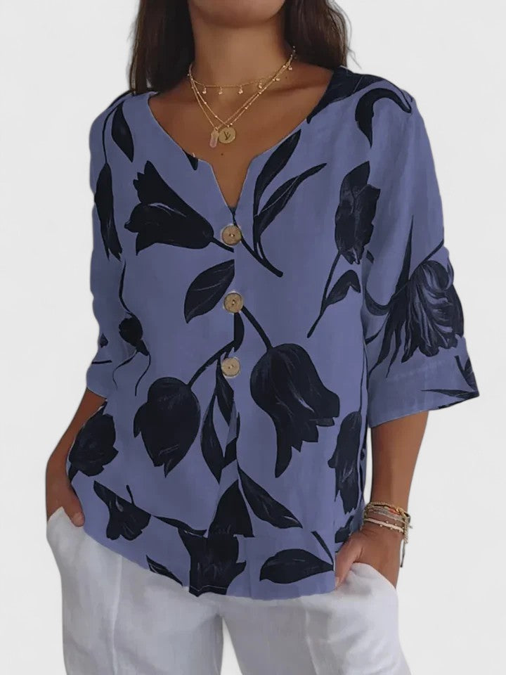 Versatile women's floral V-neck top, perfect for everyday elegance. Comfortable long-sleeve blouse for all seasons.