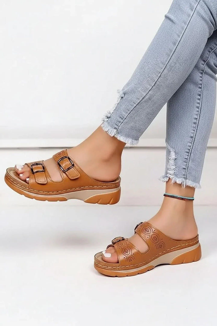 Stylish yellow vintage open-toe wedge sandals for women. Comfortable platform summer shoes with a classic look.