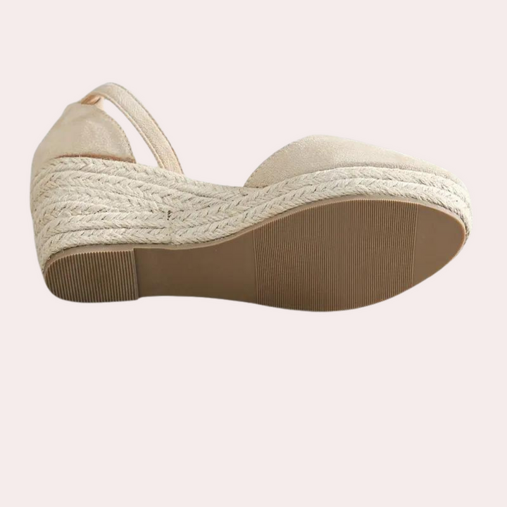 Casual summer women's wedge sandals, comfortable and stylish with an adjustable ankle strap.