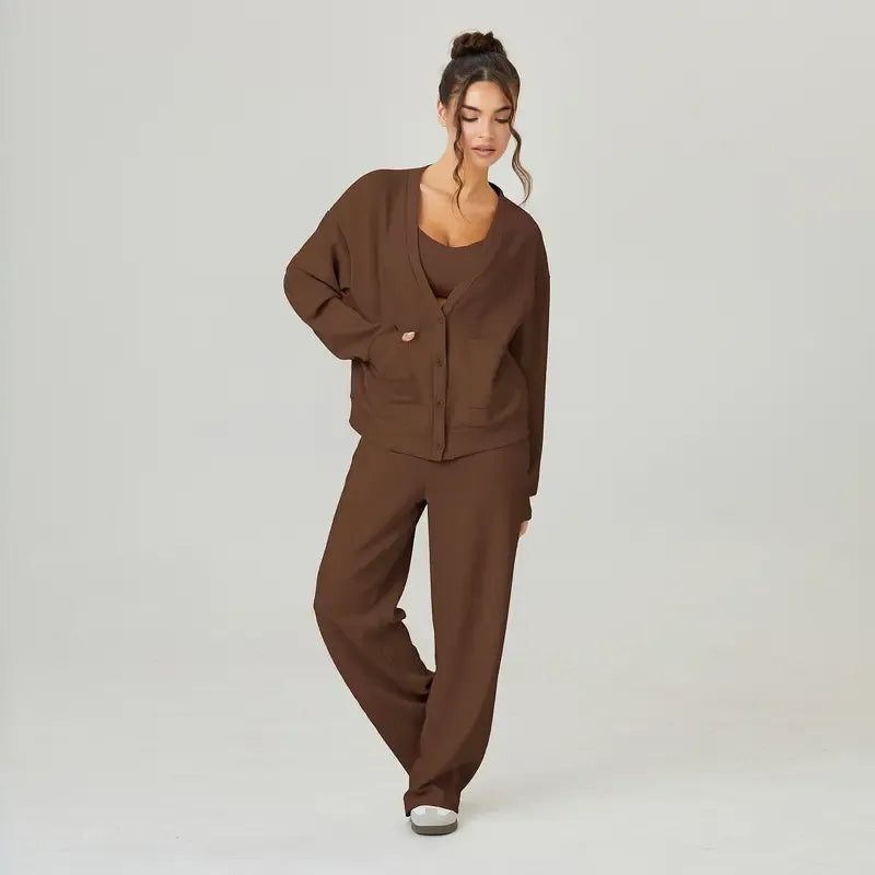 Comfortable two-piece women's knitwear lounge set featuring a cardigan and matching trousers.