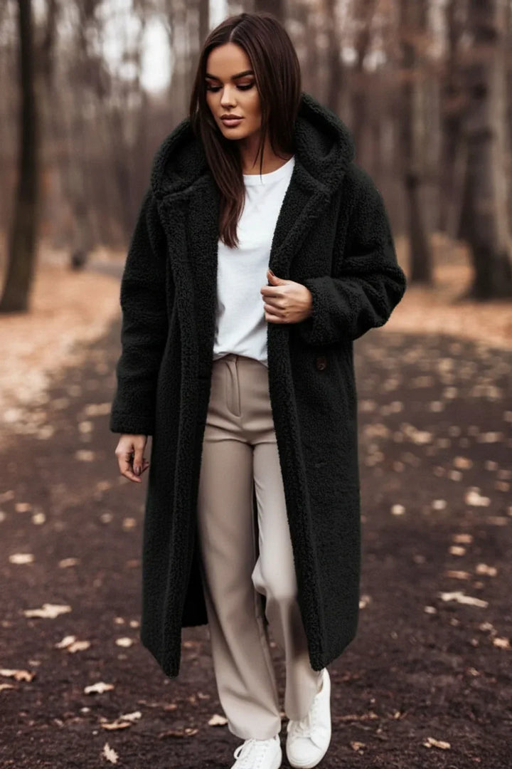 Stylish oversized teddy coat for women, featuring a cozy hood and button-front.