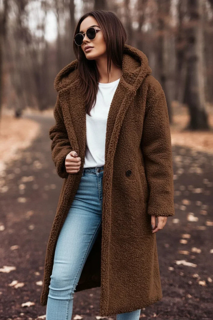 Cozy button-front hooded teddy coat, a warm and stylish winter essential for women.