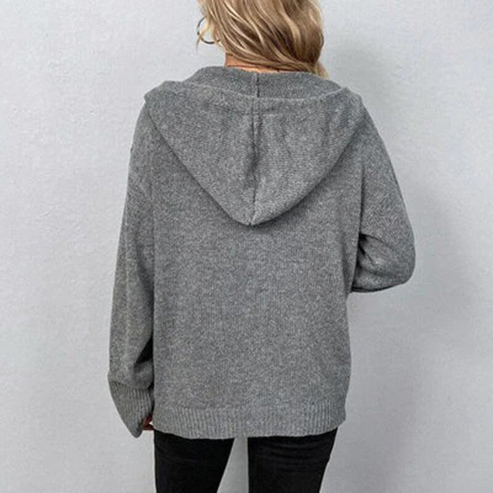 Fashionable women's hooded knit cardigan with button front closure, ideal for comfortable layering.