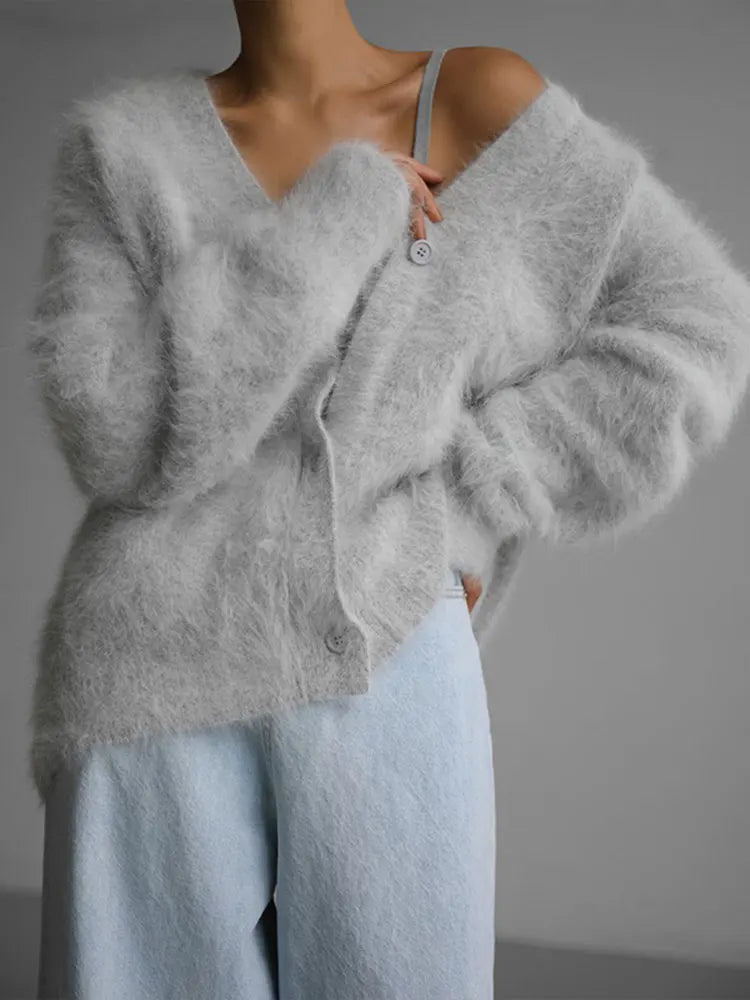 Folded women's faux cashmere oversized cardigan, showing its plush texture and quality