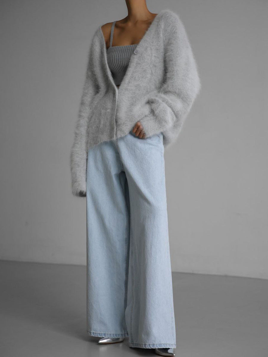 Close-up of the hemline of a women's oversized sweater, soft and comfortable for winter