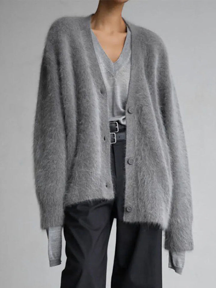 Woman walking outdoors wearing a stylish women's oversized cardigan, comfortable and chic