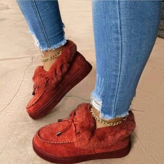 Women's round toe slip-on shoes with plush lining for cozy warmth in winter and chilly days.
