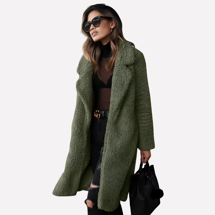 Women's cozy longline teddy coat, perfect for stylish winter fashion. Relaxed fit outerwear jacket.