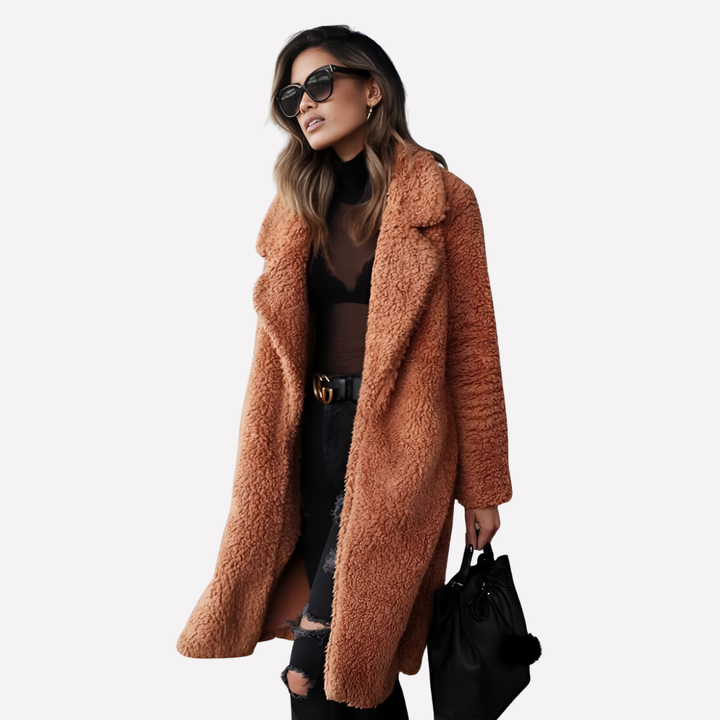 Plush women's longline teddy coat, offering cozy warmth and chic style for fall & winter outerwear.