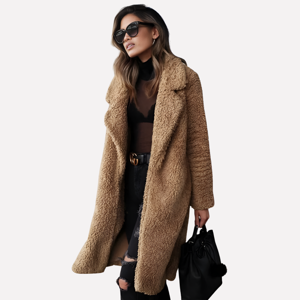 Stylish women's longline teddy coat. Chic relaxed fit outerwear jacket, ideal for effortless fall and winter fashion.