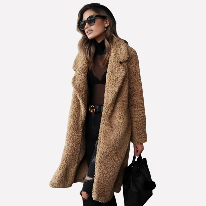 Stylish women's longline teddy coat. Chic relaxed fit outerwear jacket, ideal for effortless fall and winter fashion.