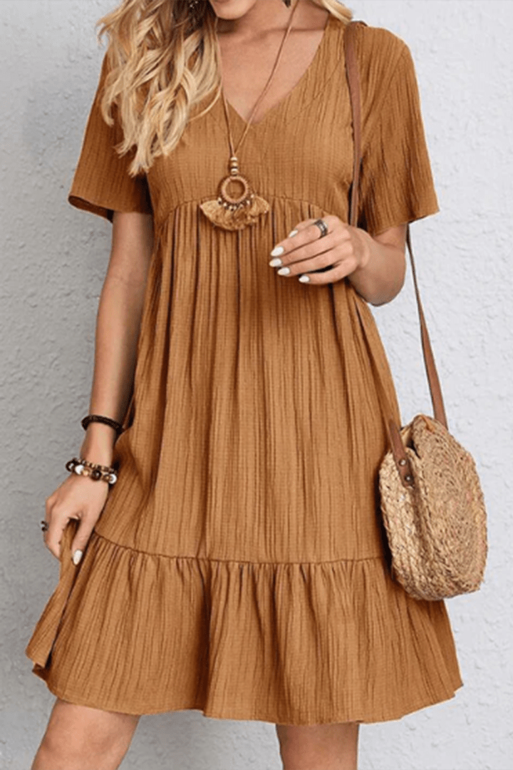 Elegant women's midi dress. Versatile day-to-night style, perfect for casual or dressed-up looks.