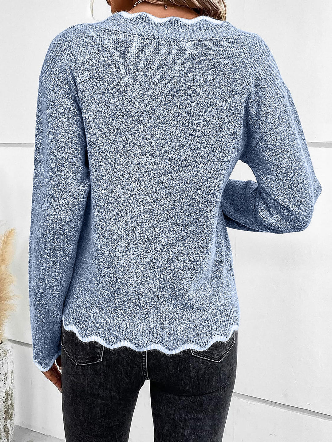Comfortable relaxed fit women's pullover sweatshirt with a stylish notch V-neck.