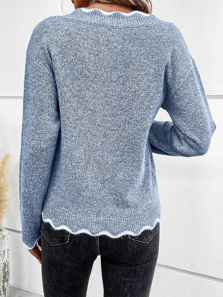 Comfortable relaxed fit women's pullover sweatshirt with a stylish notch V-neck.