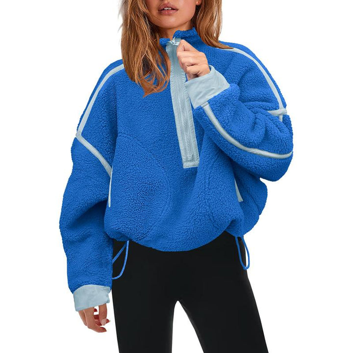Model wearing a comfortable women's sherpa half-zip pullover, showcasing its casual winter style.