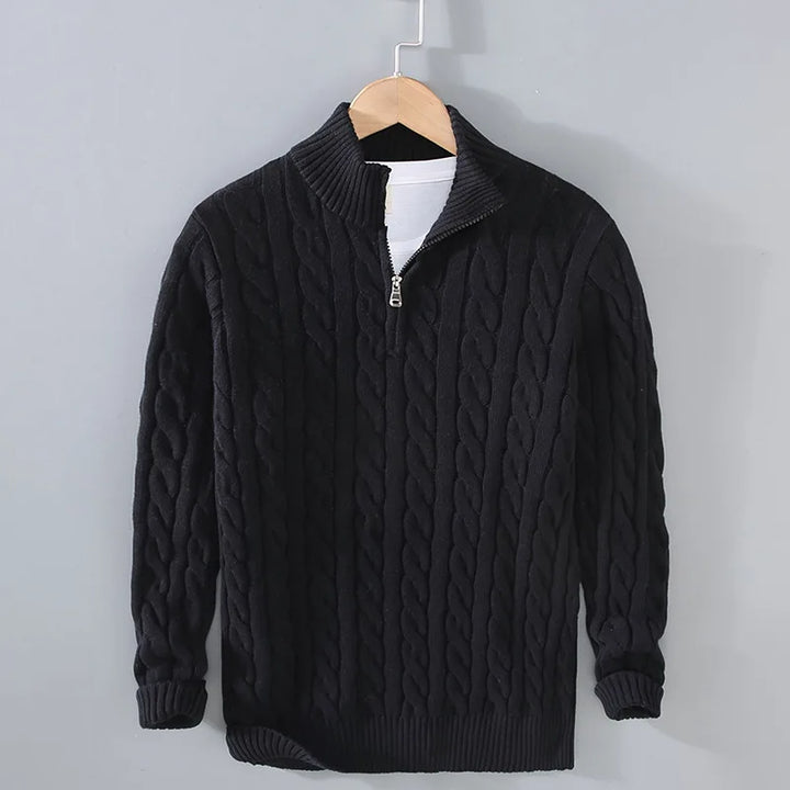 Half-zip detail on a women's cable knit pullover sweater, perfect for layering and warmth.