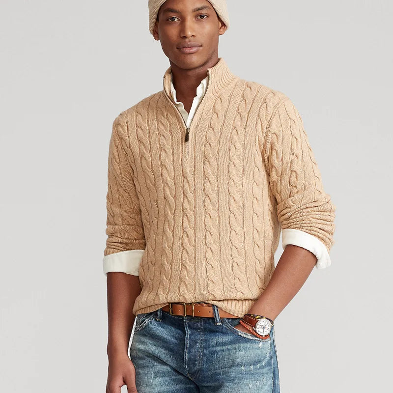 Detail shot of the ribbed collar and half-zip on a women's comfortable cable knit sweater.