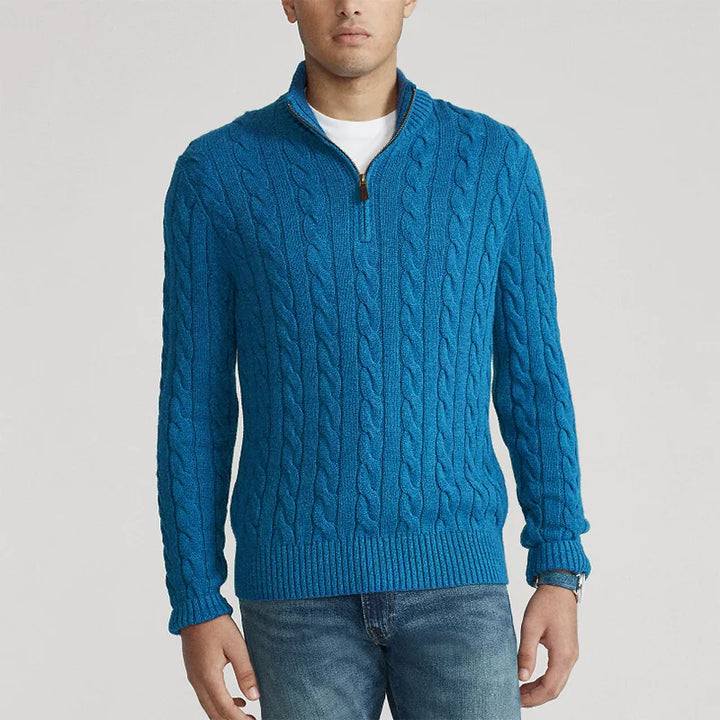 Front view of a women's half-zip cable knit pullover, a warm and fashionable piece of knitwear.