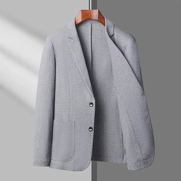 Classic women's lightweight blazer in cream, a versatile and breathable outerwear piece for modern styles