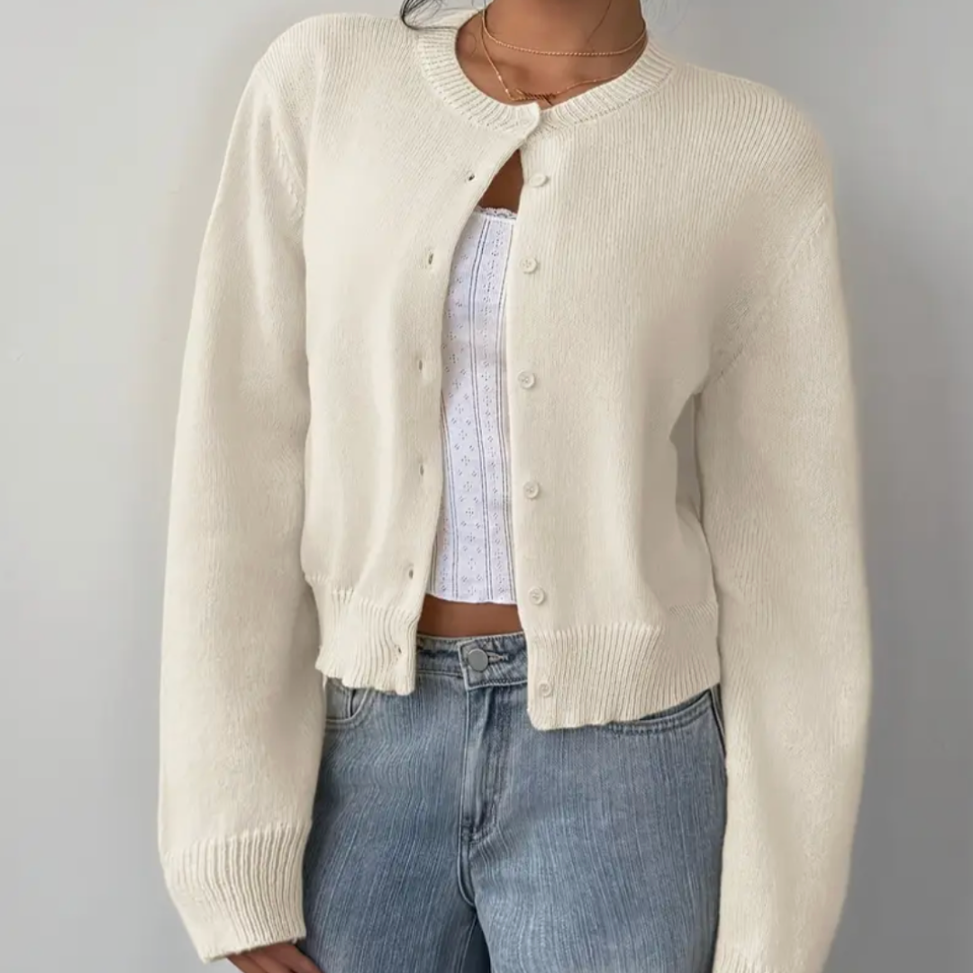 Women's cropped button cardigan in a vibrant spring green, perfect for summery casual outfits.