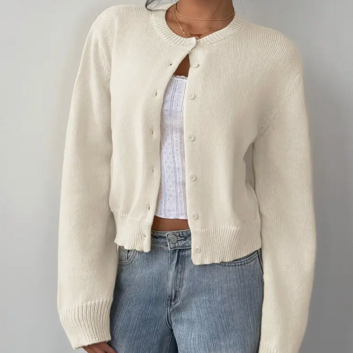 Women's cropped button cardigan in a vibrant spring green, perfect for summery casual outfits.